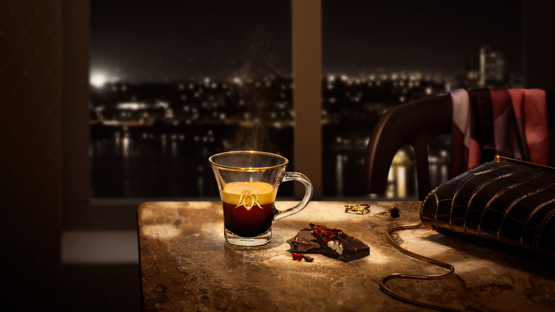 Shows a picture of L'or Ristretto on a table in an apartment